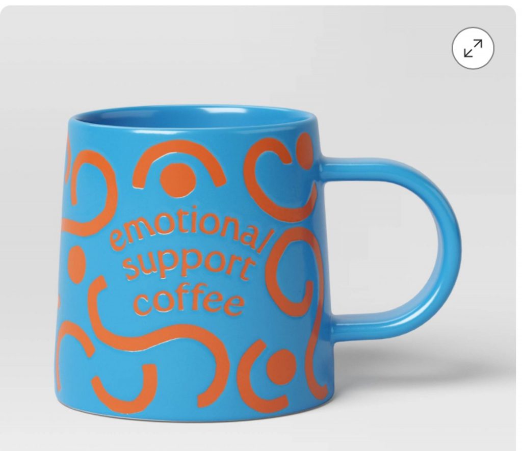 Blue mug with orange swirls