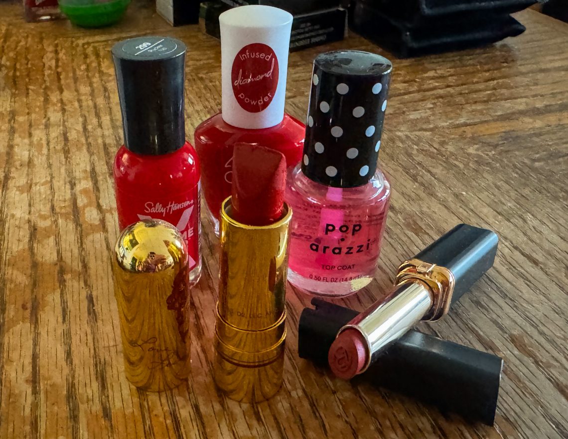 Lipsticks and nail polish on a table